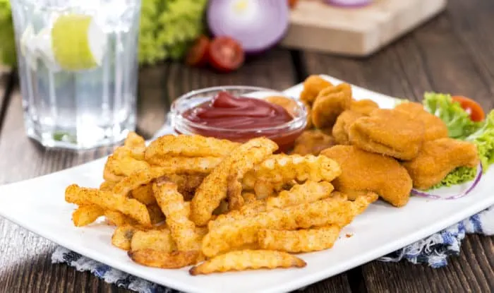Portion of Chicken Nuggets with fries