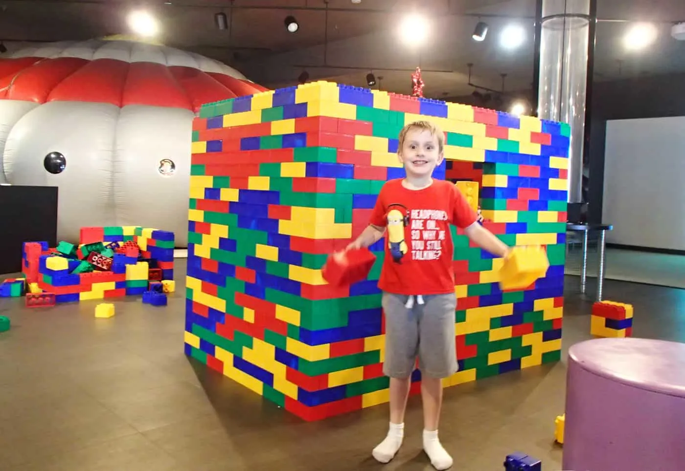 Myseum kid plays with giant legos