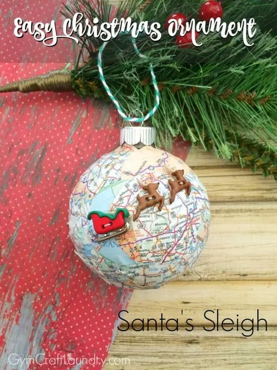 Christmas  ornament with map paper and Santa sleigh