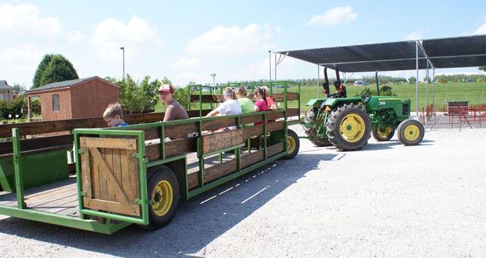 Eckert's farm wagon loaded with visitors to take to the field.