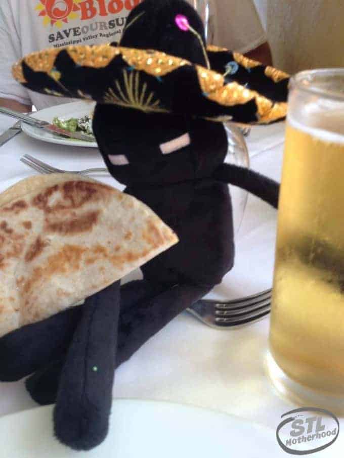 minecraft Enderman toy wearing a sombrero and eating a taco on a trip to Mexico