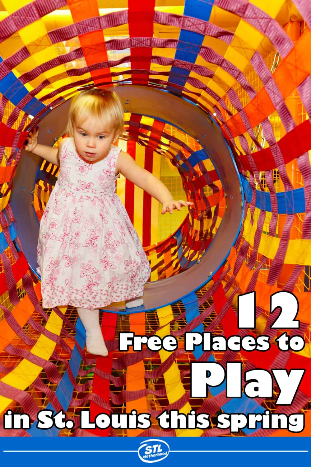 kid in tunnel made of colorful webbing straps