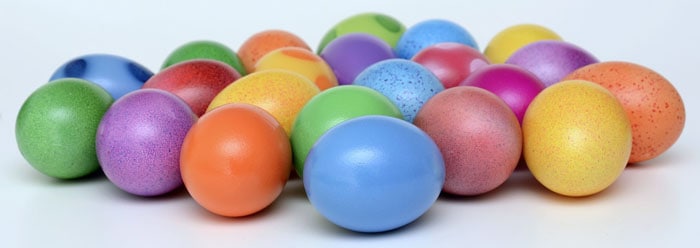 a dozen colorful dyed easter eggs