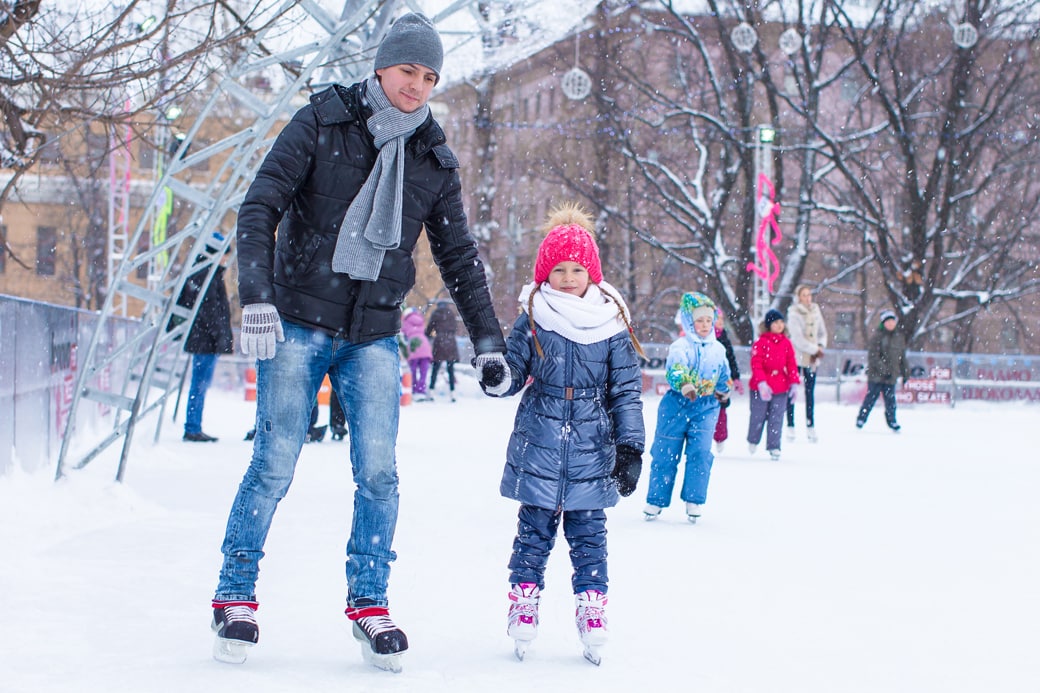 dad and daughter ice skating