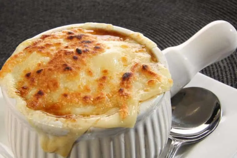 French onion soup served in a crock with toast and melted cheese