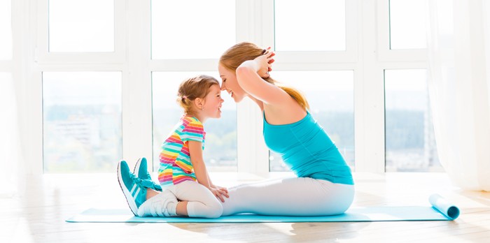 mom exercising with kid