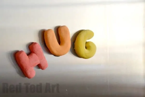 The word HUG spelled out in salt dough shapes