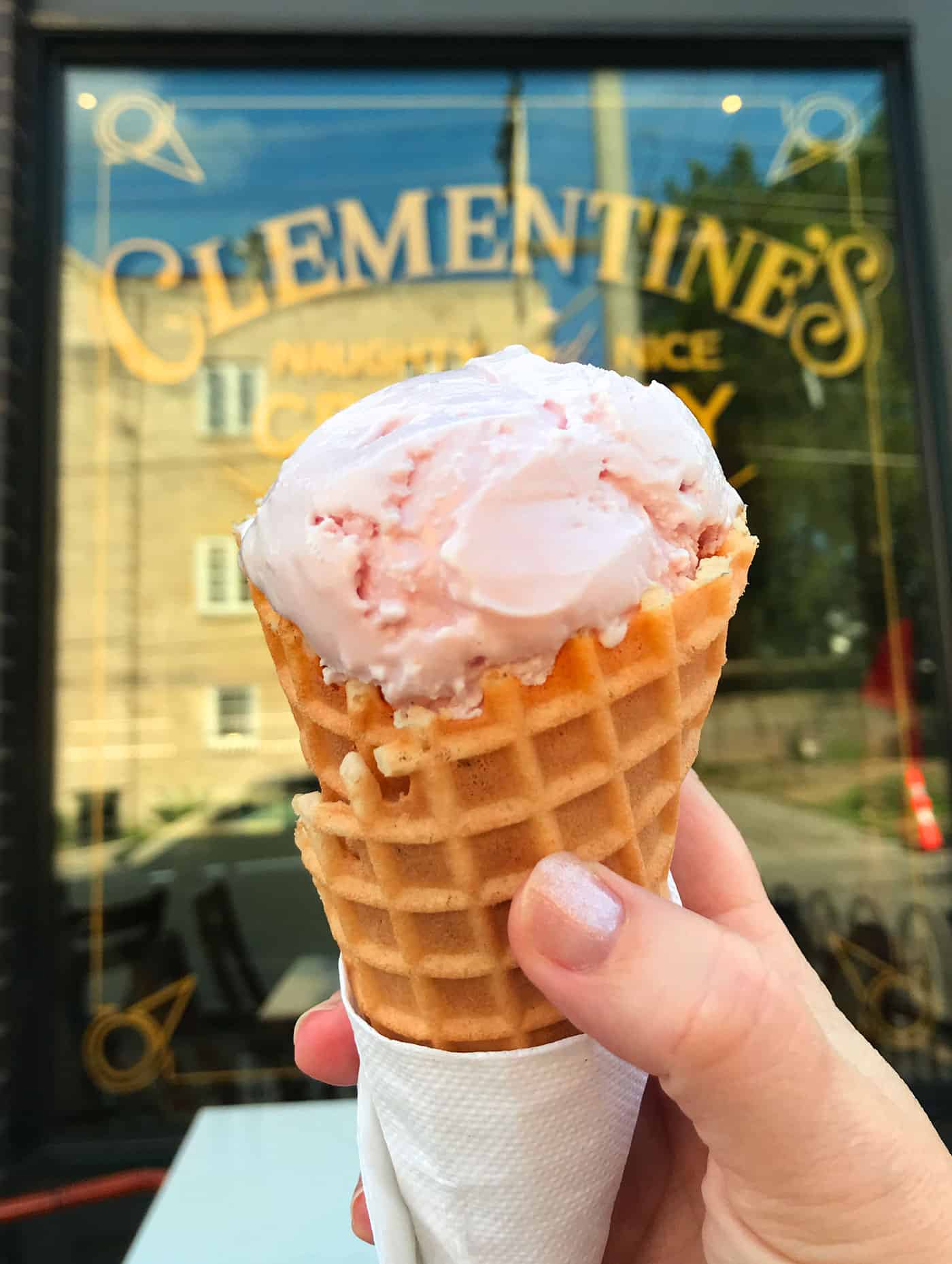 Cherry Ice cream in a waffle cone at Clementines in St. Louis