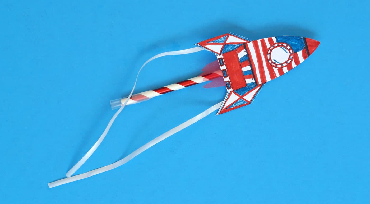 4th of July paper rocket on a straw, red white and blue