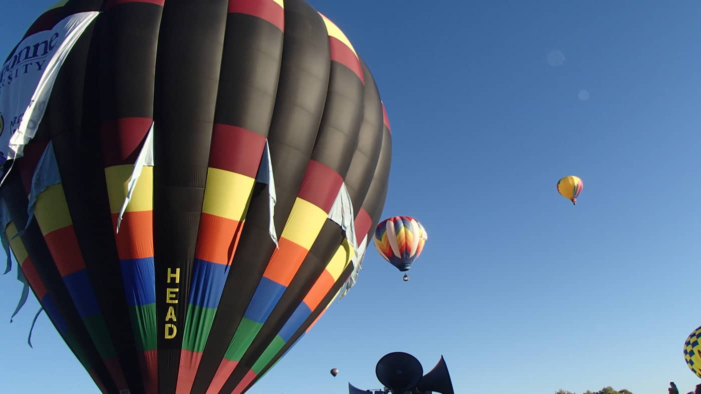 Hot air balloons lifting off at the Great Forest Park Balloon Race