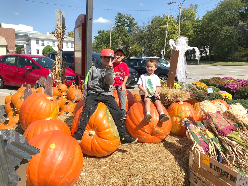 kids on pumpkins