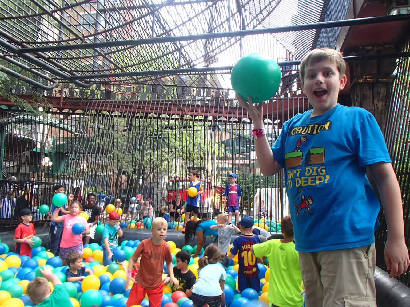 kid at the ball pit at City Museum