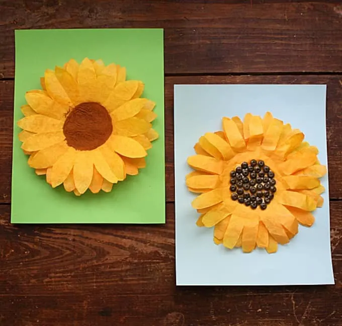 sunflowers made from orange colored coffee filters