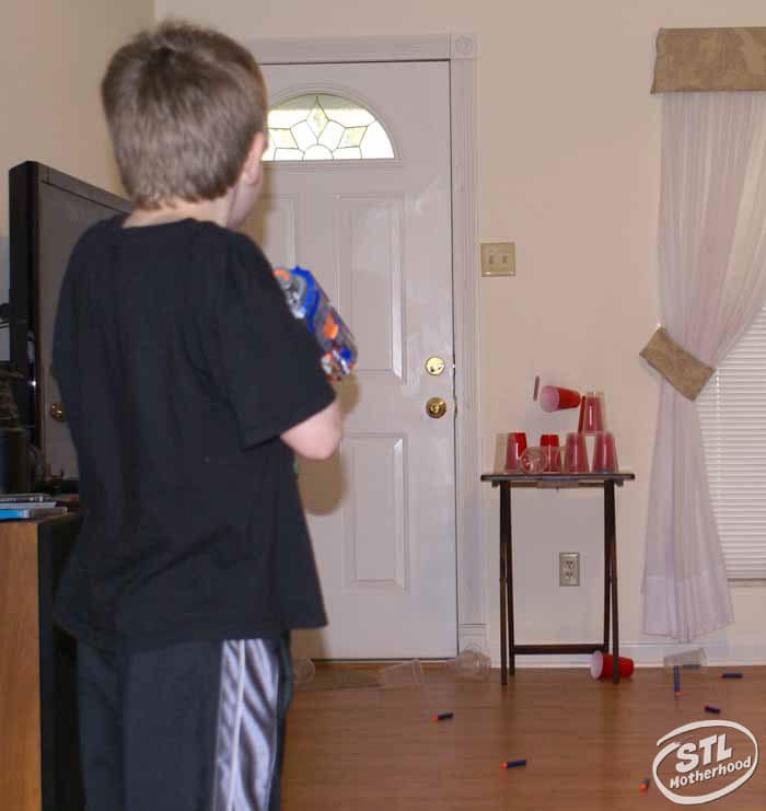 boy playing with nerf