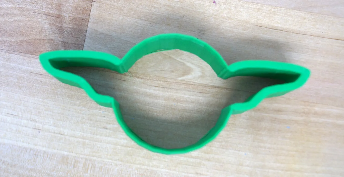 Baby Yoda cookie cutter in green made with a 3D printer