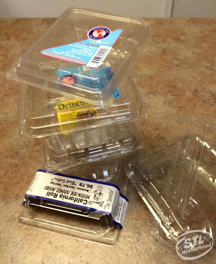 stack of plastic fruit containers