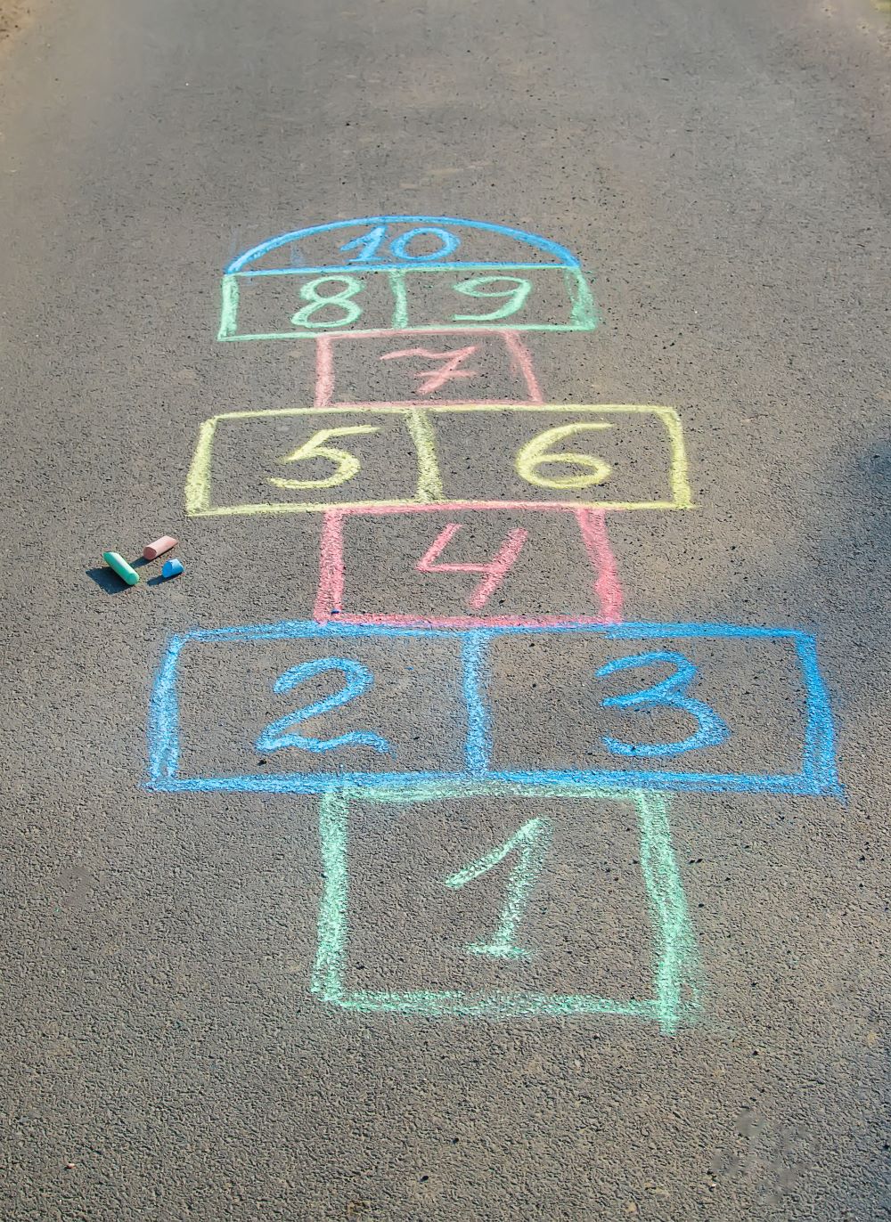 a hopscotch grid written in chalk