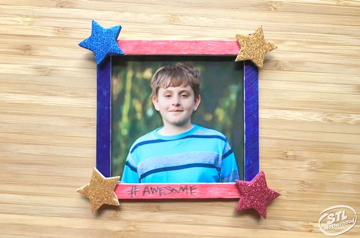 red and blue popsicle stick frame with foam stars