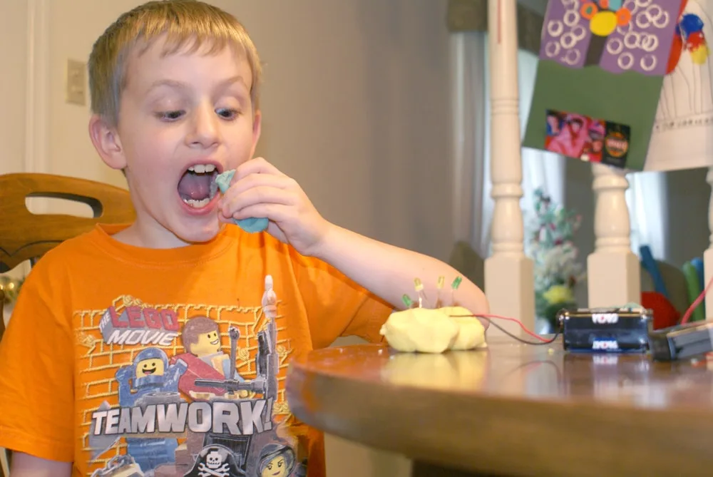 boy tastes squishy circuit dough -- it's non toxic