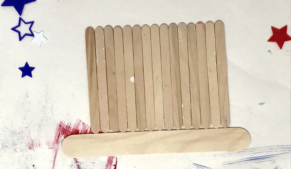 popsicle sticks lined up in a rectangle