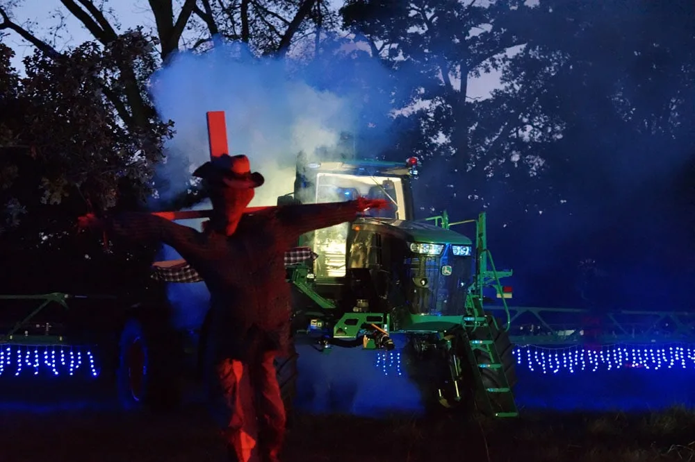 the Haunted Farm at Grants Farm with twinkle lights, a scare crow and spooky tractor