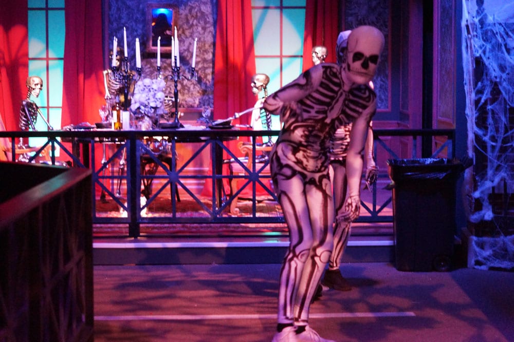 Person in skeleton costume at Union Station Halloween maze