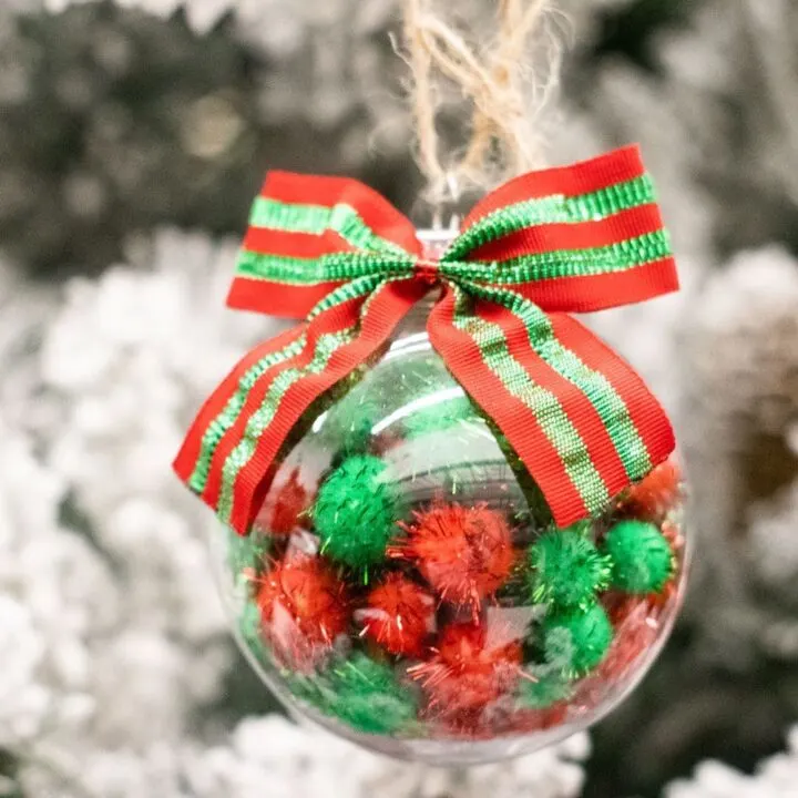 pom pom filled ornament on tree