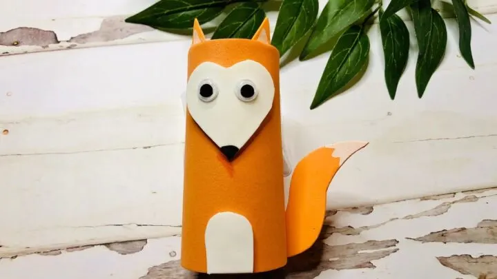 paper fox crafted from orange cardstock and a toilet paper roll