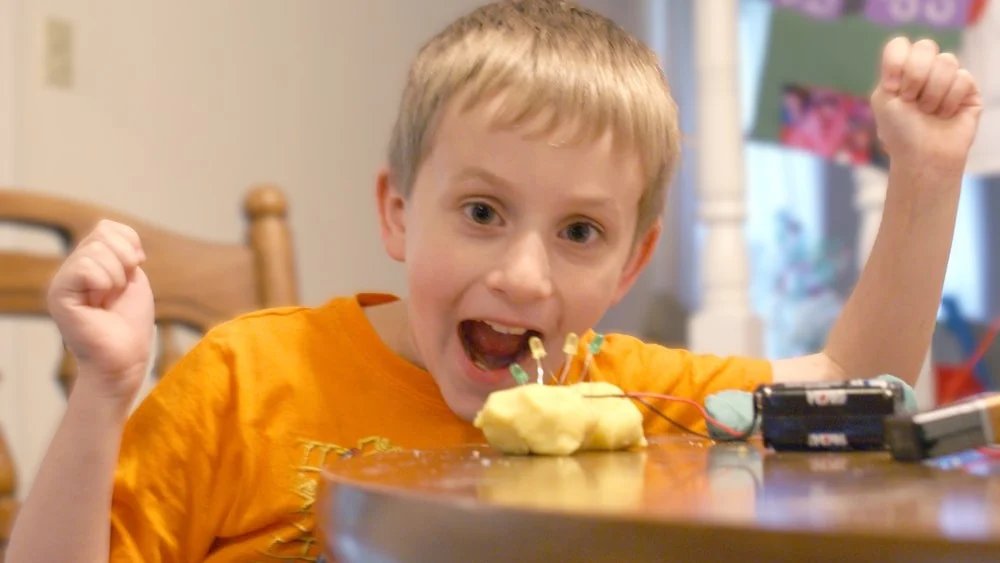 kid crafting with home made play dough